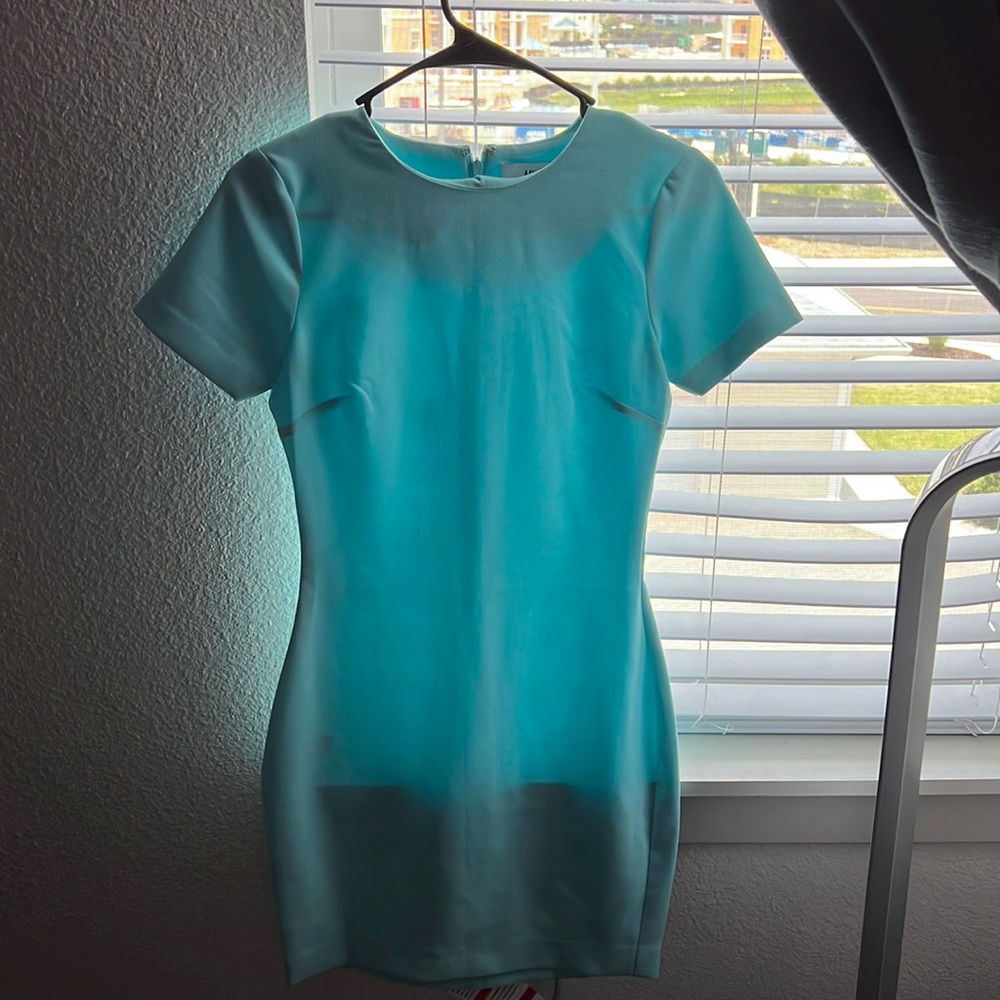 Likely baby blue dress
